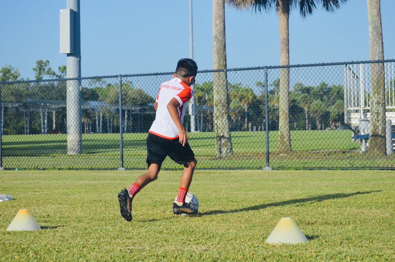 Player practicing close control on the training field